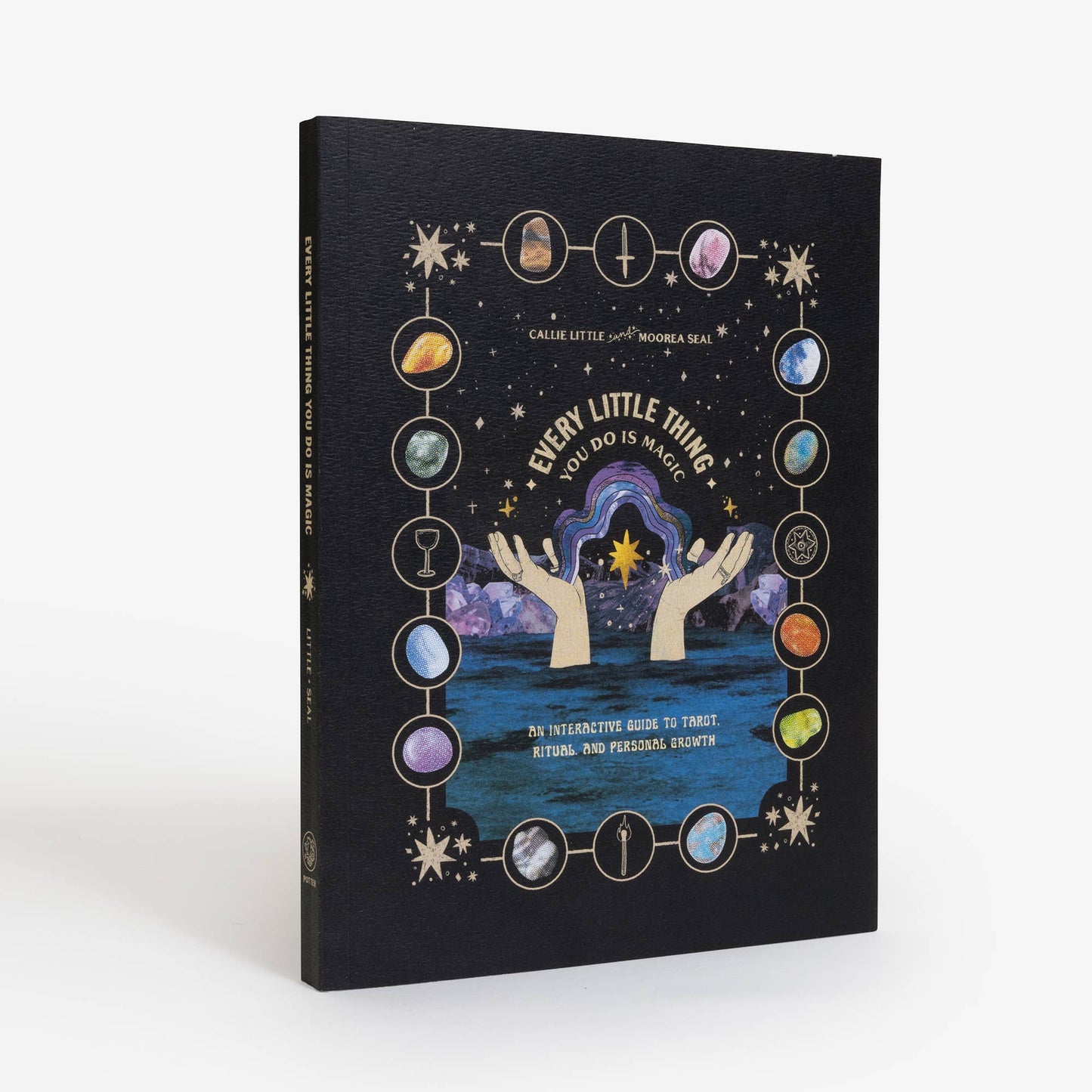 Book titled 'Every Little Thing You Do is Magic' with celestial design on a white background