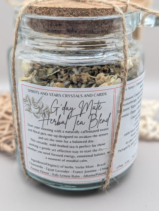 Jar of herbal tea blend with a label on a light background