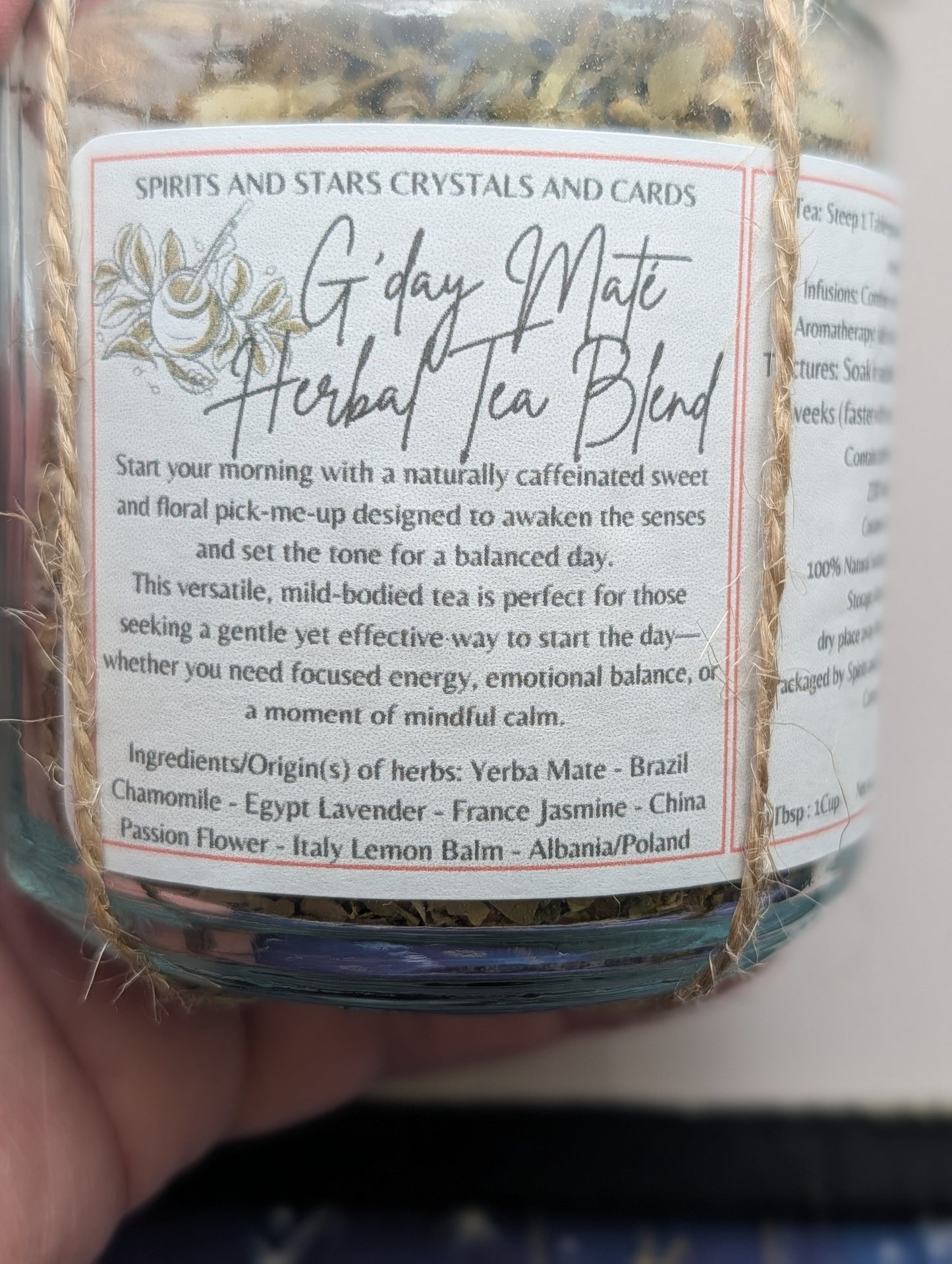 Jar of 'G'day Mate Herbal Tea Blend' with label detailing ingredients and benefits.
